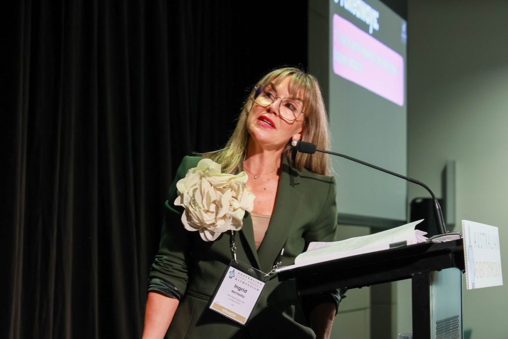 Ingrid Maynard presenting at the Australian Event Symposium