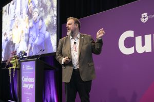 Arnold Dix presenting The Curious Lawyer keynote