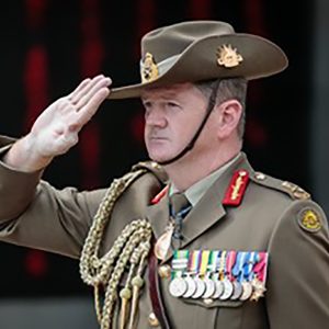 Maj. Gen. Gus McLachlan saluting in Australian Army dress uniform
