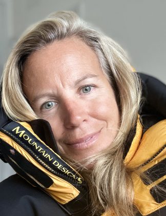 Jen Willis motivational speaker in expedition gear on Mount Everest