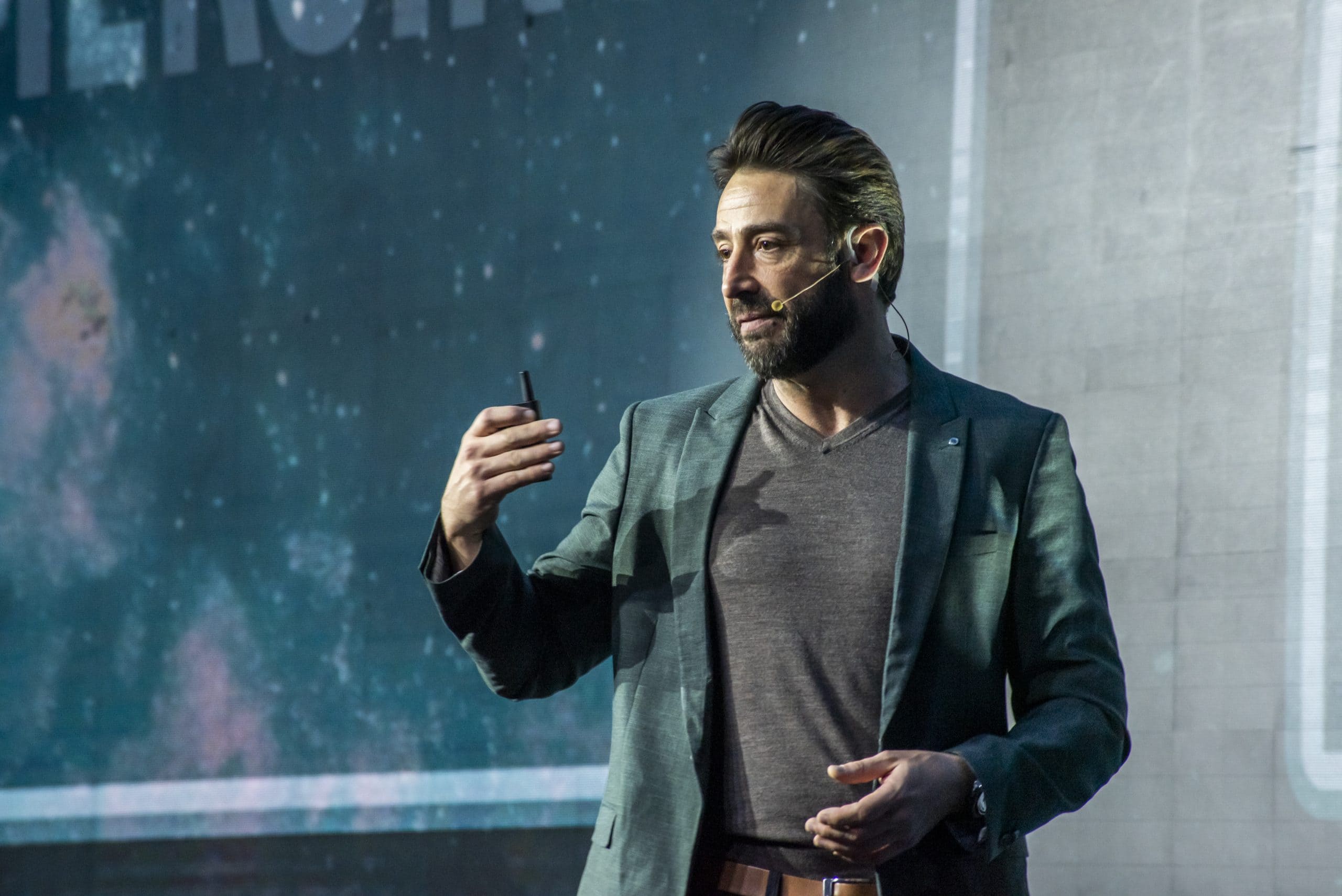 James Lisica presenting on stage