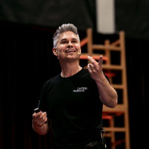 Dan Aubin presenting on stage