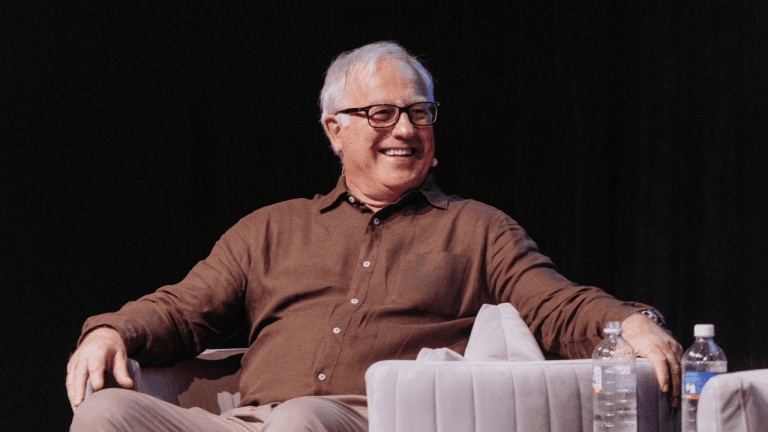 On stage at a speaking event